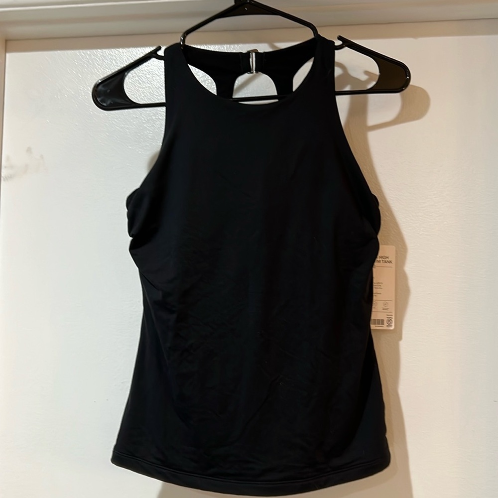 NWT Athleta Maldives high neck swim tank
Size 34B/C. Black.